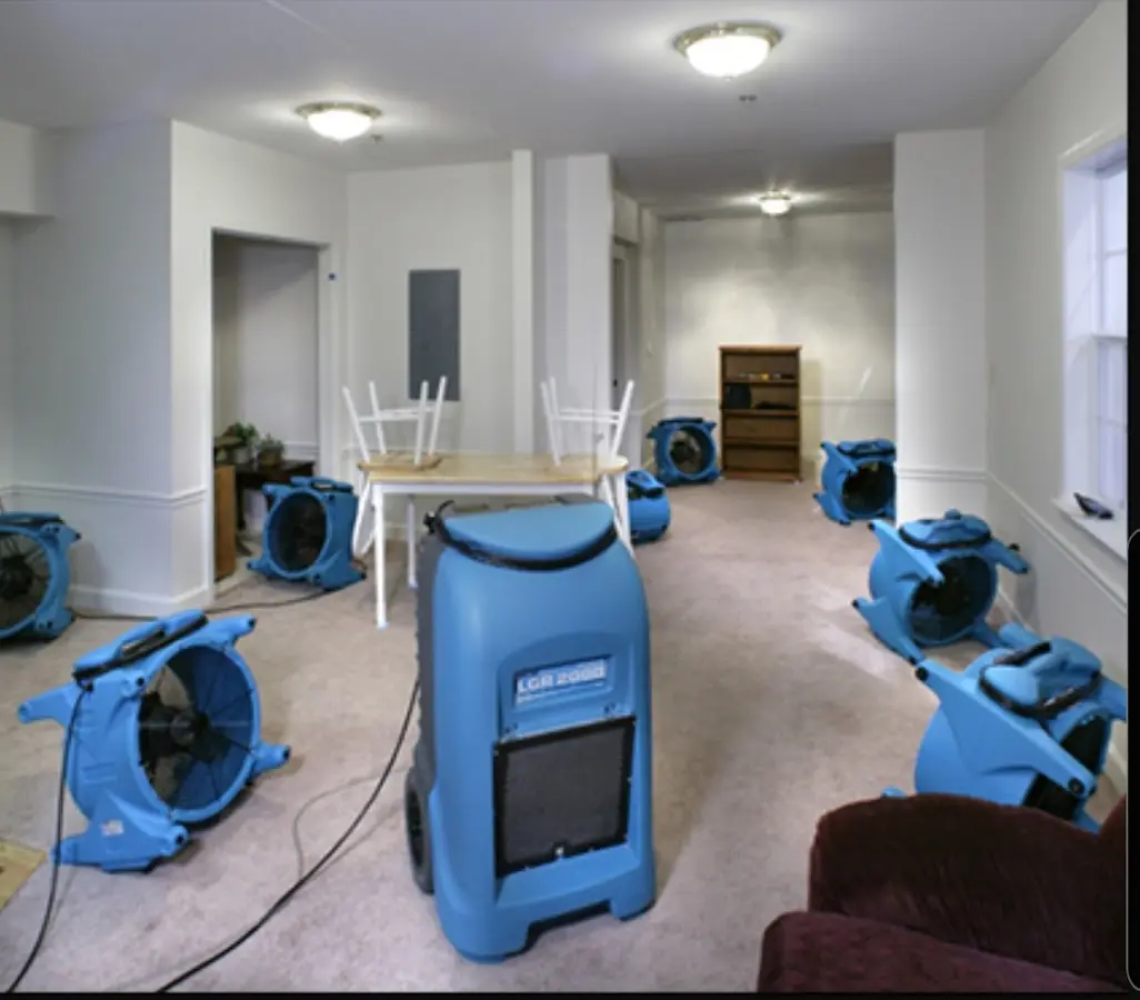 Air movers and dehumidifier setup for Water Damage Restoration in Verdigris